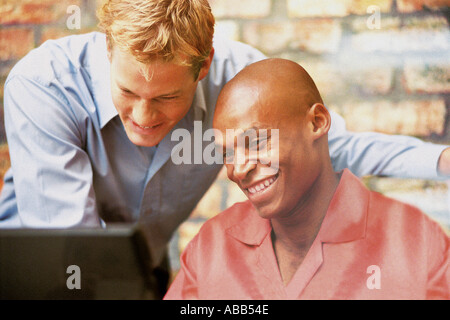 Businessmen working on computer Stock Photo