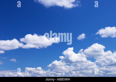 Cumulus humilis fluffy white clouds blue sky Stock Photo