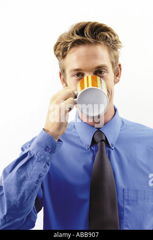 Businessman drinking a cup of tea Stock Photo