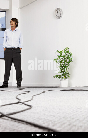 Businessman in empty office Stock Photo