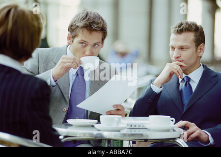 Businesspeople having meeting at cafe Stock Photo
