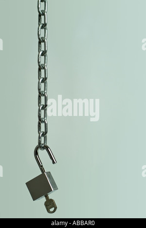 Metal Chain And An Unlocked Padlock Stock Photo