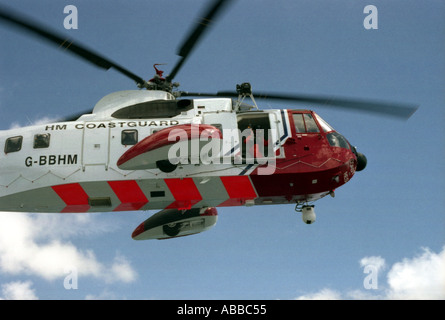 Coastguard Rescue Helicopter seen from the side Stock Photo