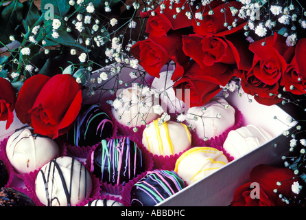 Box of candy with red roses Stock Photo