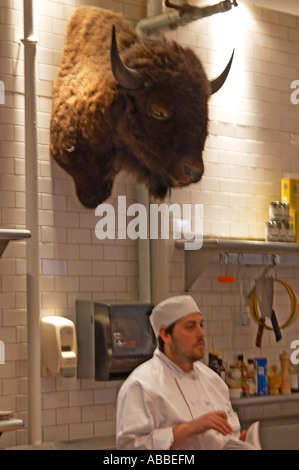 meat department butcher bison buffalo mounted head Dean & Deluca specialty food store NYC Stock Photo