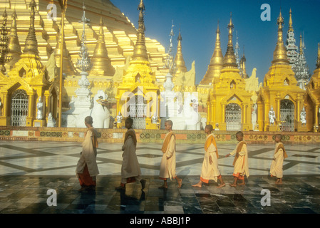 Very young nuns in pink robes at the famous Shwedagon Pagoda in Rangoon (Yangon),Burma ( Myanmar) Stock Photo