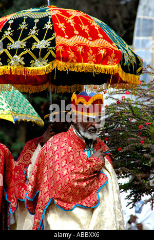 Ethiopian Orthodox Christianity procession of priests and bishop with colourful umbrellas around the New Cathedral Axum Ethiopia Stock Photo