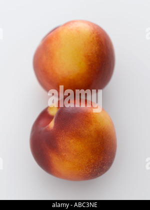 Two nectarines on white - high end Hasselblad 61mb digital image Stock Photo