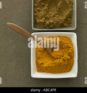 Turmeric powder and cumin - one of a series of spice images Stock Photo