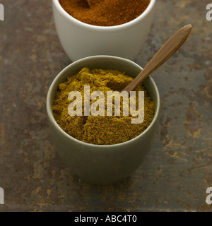 Curry powder and chilli powder - one of a series of spice images Stock Photo
