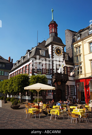 Old town hall with pavement cafe in Mayen, Germany Stock Photo