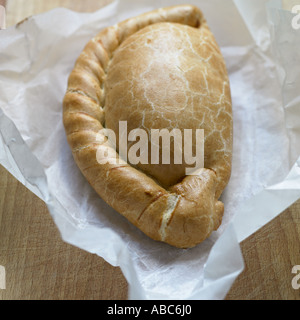 Pastie with parchment paper on wooden background Stock Photo