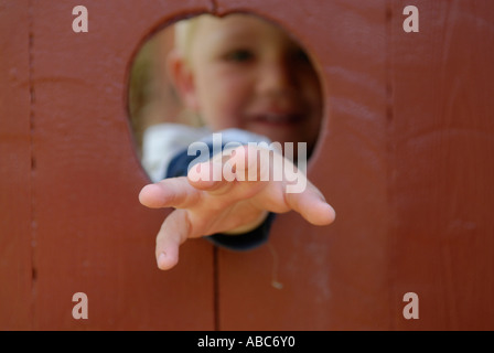 Little boy looks in camera Stock Photo