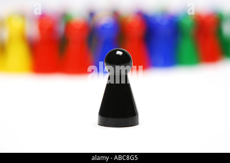 Group of chinese checkers figures with single black token Stock Photo