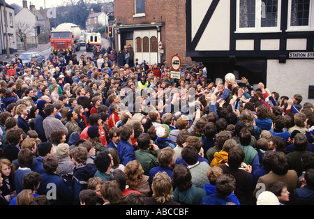 Ashbourne shrovetide football Derbyshire Men fight for the ball in the small town of Ashbourne England UK 1980s circa 1985 HOMER SYKES Stock Photo