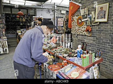 CHINA XI'AN Xi'an market in the Old Muslim Quarters with Chinese and Western shoppers Stock Photo