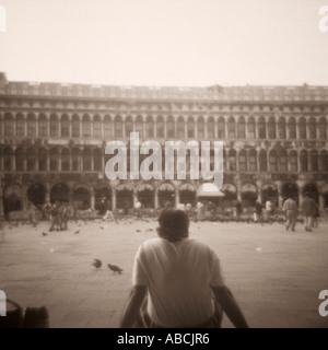 Man Sitting in the Piazza San Marco - Venice, Italy Stock Photo