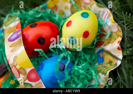 colourful easter eggs in basket Stock Photo