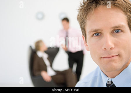 Three office workers Stock Photo