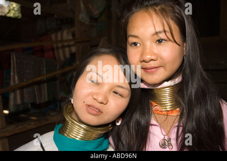 Young Karen longneck women in refugee village near Burmese border outside Mae Hong Son north Thailand