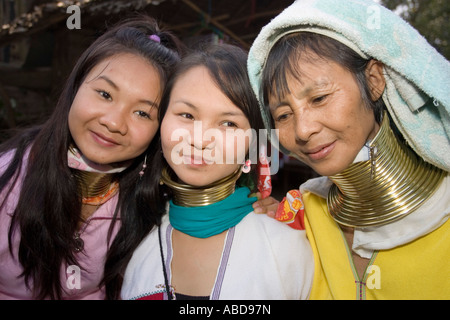 Mother and daughters Karen longneck women in refugee village near Burmese border outside Mae Hong Son north Thailand