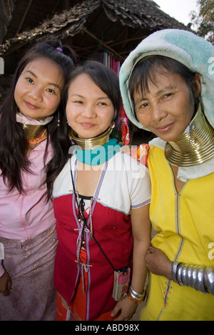 Mother and daughters Karen longneck women in refugee village near Burmese border outside Mae Hong Son north Thailand