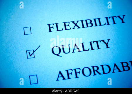 paper with words quality box checked concept of quality first Stock Photo