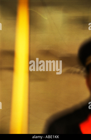 Yellow stripe outline Hotel doorman Stock Photo