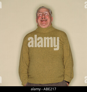 Happy man with his hands in his pockets Stock Photo