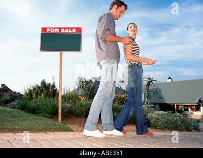 Couple on way to view house Stock Photo