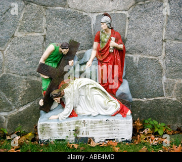 The seventh stage of the cross at a replica of the Vatican gardens at a church in Bridgeport Connecticut Stock Photo