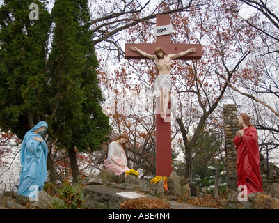 Jesus on the cross at a replica of the Vatican gardens at a church in Bridgeport Connecticut Stock Photo