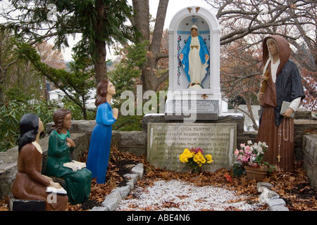 Religious prayer scene at a replica of the Vatican gardens at a church in Bridgeport Connecticut Stock Photo