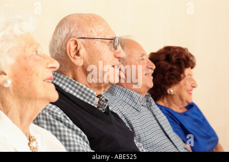 Profiles of elderly people smiling Stock Photo