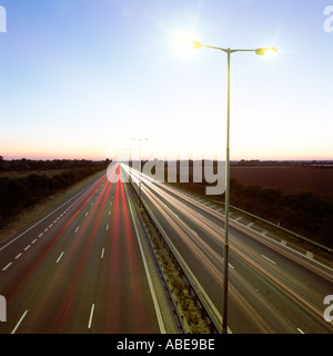 Head and tail-lights on motorway Stock Photo