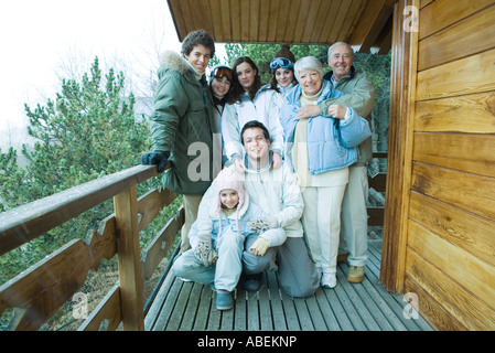 Group on terrace of chalet, portrait Stock Photo - Alamy