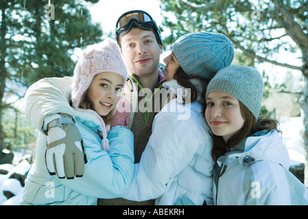 Young friends wearing winter clothing, portrait Stock Photo