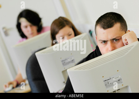 Cardiff University students studying for exams doing online research in the university library Cardiff South Wales UK Stock Photo