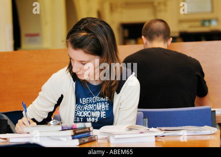 Cardiff University students studying for exams in the university library Cardiff South Wales UK Stock Photo