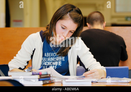Cardiff University students studying for exams in the university library Cardiff South Wales UK Stock Photo