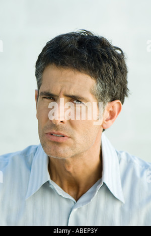 Man, furrowing brow, portrait Stock Photo