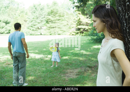 Family playing outdoors Stock Photo