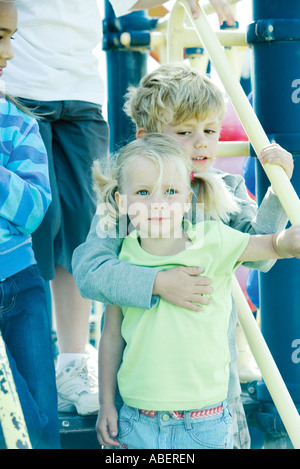 Children on playground equipment Stock Photo