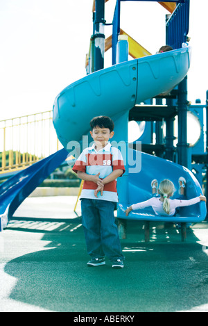 Children on playground equipment Stock Photo