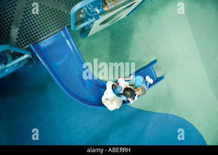 Children on playground equipment Stock Photo