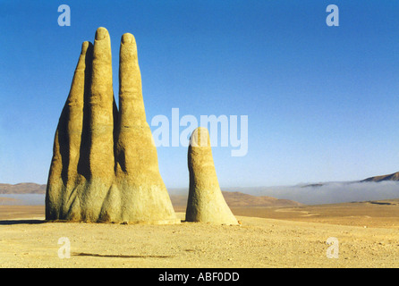 Hand sculpture in the Atacama desert in Northern Chile Stock Photo