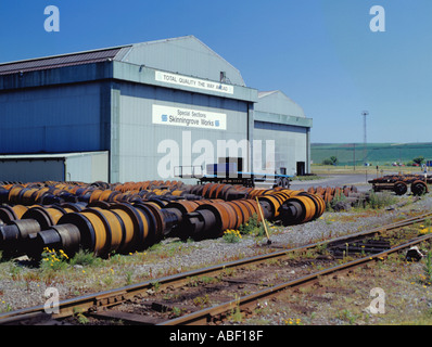 Steel rollers outside the Skinningrove Steel Works, Skinningrove, Cleveland, England, UK. Stock Photo