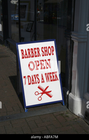 Busy Barber. Photograph by Kim Craig. Stock Photo