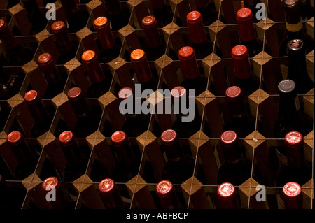 racks of wine lined up in a restaurant to store the wine ready for drinking Stock Photo