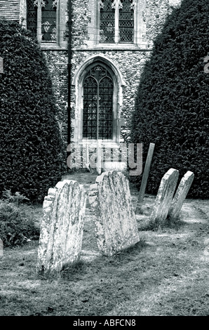 Gravestones outside the church in the village of  Finchingfield in Essex Stock Photo